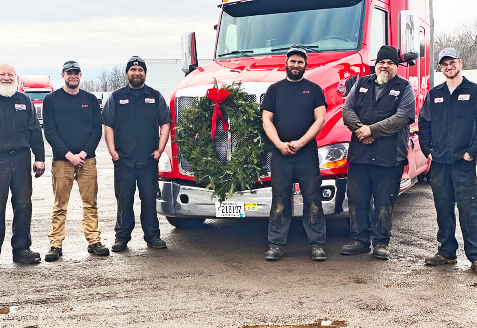 Wreaths across America Truck Grille, Driver couple